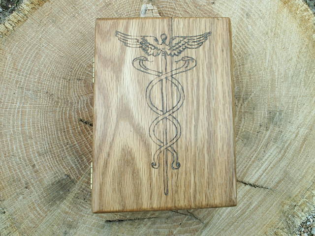 School, office, home, portrays the ancient Medical Caduceus Symbol