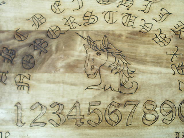 lettering and symbols of the druidic unicorn