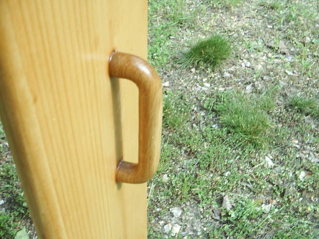 Solid Oak handle for easy transport.