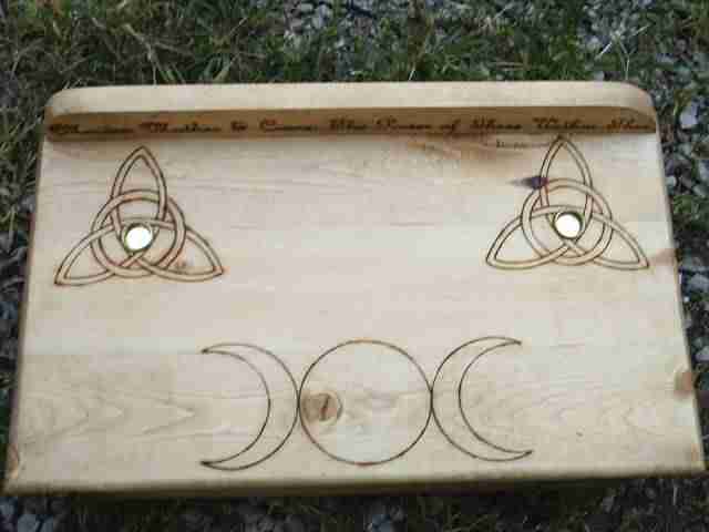 The Triquetra (as made popular by the Warner Brothers Charmed TV series) is most ofter used to represent the power of the Maiden, Mother, and Crone.