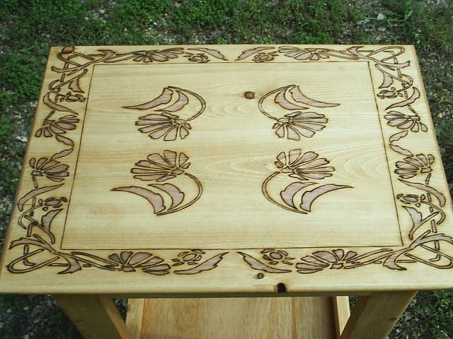Image of Floral Designs on this Night Stand Table